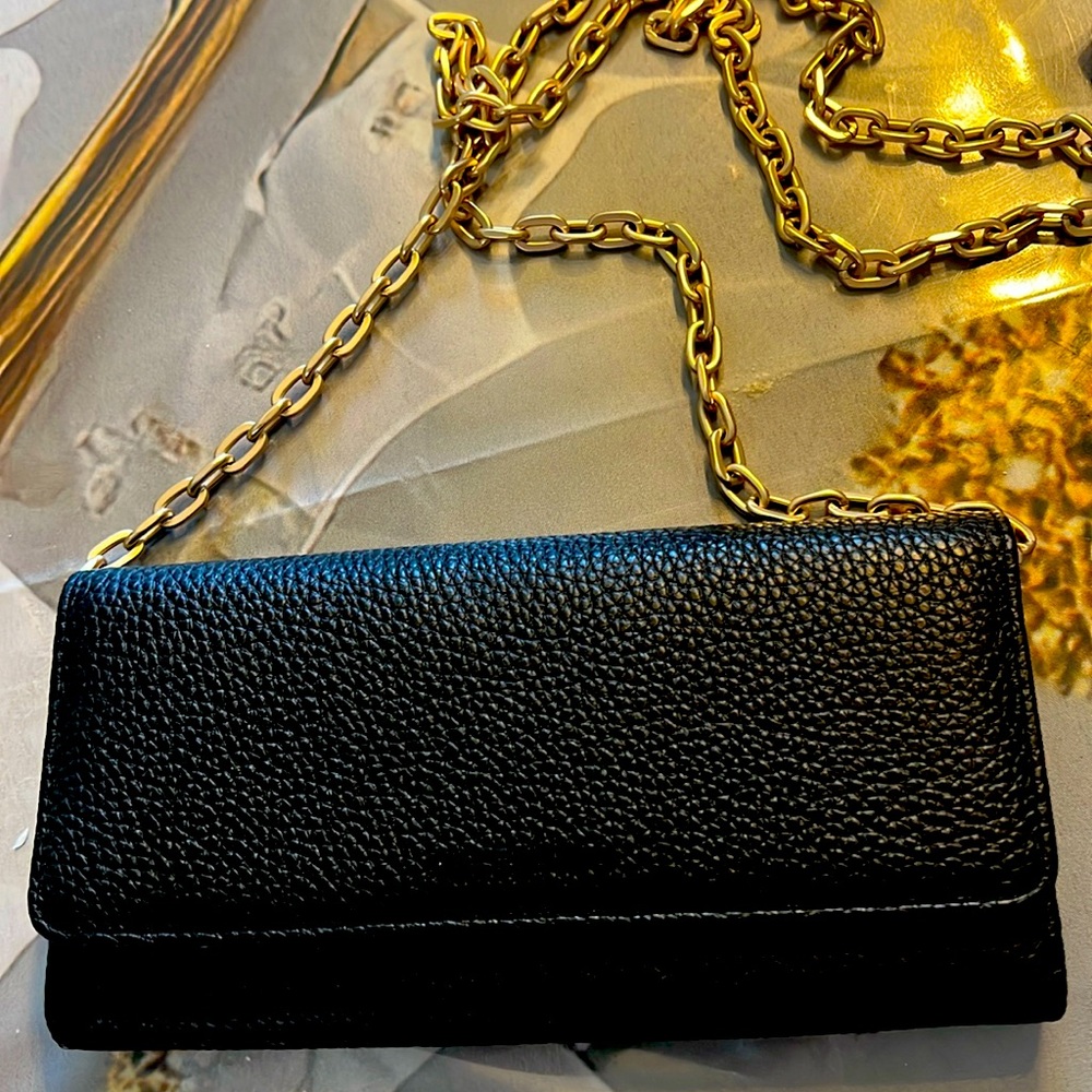 NWOT beautiful never used Valentino crossbody wallet. Place for phone.